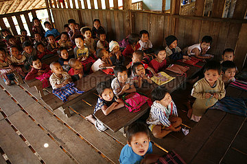 A crowded school room in La Per Her. In Myanmar (Burma)  thousands of people have settled near the border as a result of oppression in their homeland. Around 200 Burmese displaced people have settled in La Per Her  a village on the Burmese side of the bor