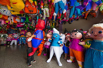 hollow paper mache dolls filled with sweets for celebrating birthdays
