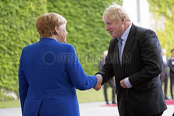 Merkel + Johnson