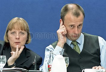 Angela Merkel  Friedrich Merz