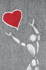 Batumi  Georgien  Zeichnung Mann mit Herz an einer Hauswand