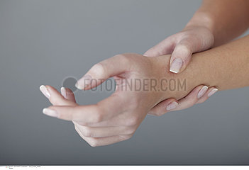 PAINFUL WRIST IN A WOMAN