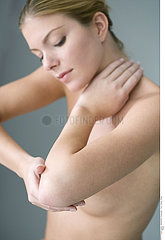 ELBOW PAIN IN A WOMAN