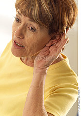 HEARING-IMPAIRED ELDERLY PERSON