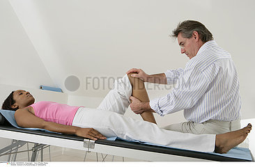 WOMAN IN PHYSICAL THERAPY