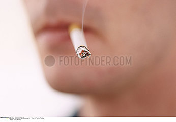 MAN SMOKING