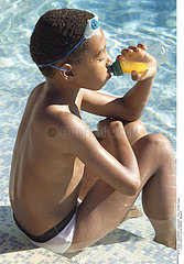 CHILD WITH COLD DRINK
