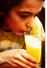 ADOLESCENT WITH COLD DRINK