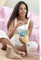 WOMAN SNACKING