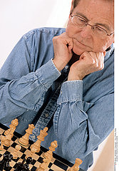 ELDERLY PEOPLE PLAYING CHESS