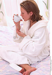 WOMAN WITH HOT DRINK
