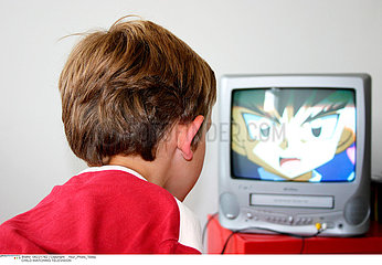 CHILD WATCHING TELEVISION