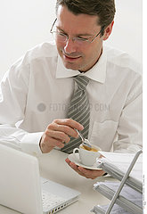 MAN WITH HOT DRINK