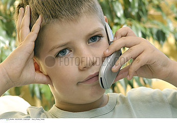 CHILD TELEPHONING