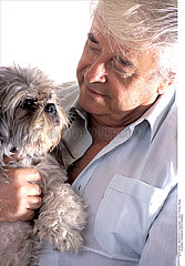 ELDERLY PERSON WITH ANIMAL
