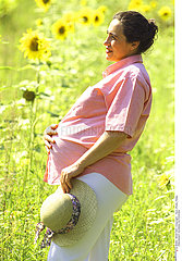PREGNANT WOMAN OUTDOORS