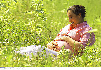 PREGNANT WOMAN OUTDOORS