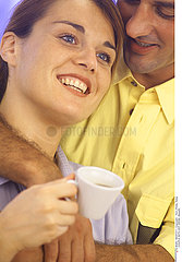 COUPLE WITH HOT DRINK