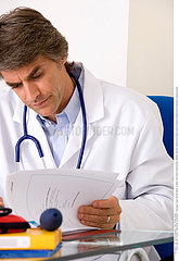 DOCTOR WITH MEDICAL RECORD
