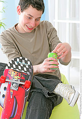 ADOLESCENT WITH COLD DRINK