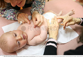 VACCINATING AN INFANT
