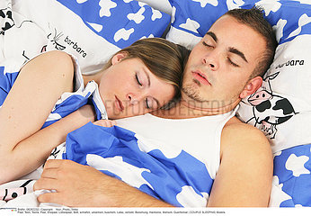 COUPLE SLEEPING