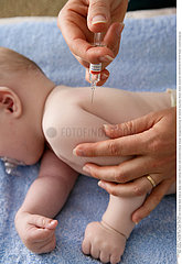 VACCINATING AN INFANT