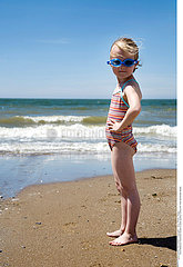 CHILD AT THE SEASIDE