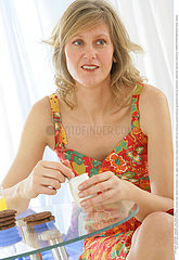 WOMAN EATING BREAKFAST