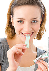 WOMAN CHEWING GUM