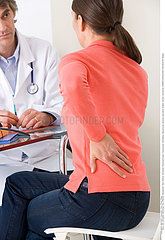 WOMAN CONSULTING FOR BACK PB.