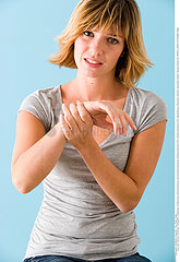 PAINFUL WRIST IN A WOMAN