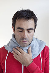 MAN WITH SORE THROAT