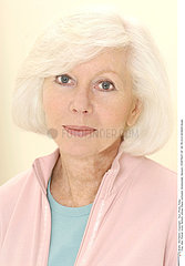 PORTRAIT OF -65 YR-OLD WOMAN