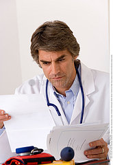 DOCTOR WITH MEDICAL RECORD