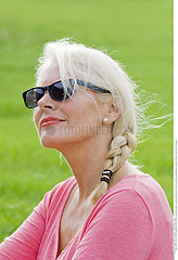 ELDERLY PERSON OUTDOORS