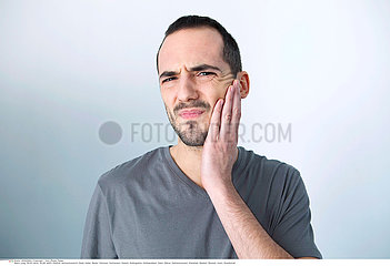 MAN WITH TOOTHACHE