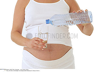 PREGNANT WOMAN WITH A DRINK