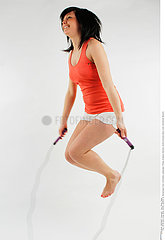 WOMAN PRACTISING A SPORT