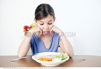 CHILD EATING A MEAL
