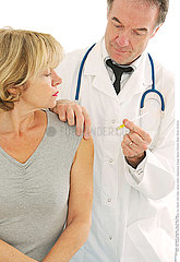 VACCINATING AN ELDERLY PERSON
