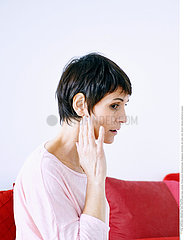 WOMAN WITH EAR PAIN