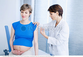 VACCINATING A PREGNANT WOMAN