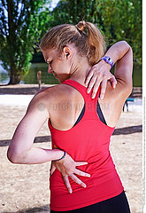 WOMAN WITH BACK PAIN