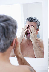 MAN WITH MIRROR