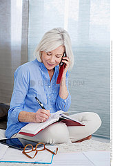 ELDERLY PERSON ON THE PHONE