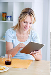 WOMAN WITH TABLET