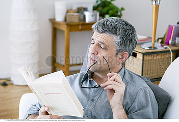 MAN READING