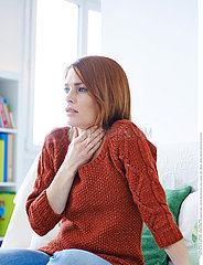 WOMAN WITH SORE THROAT