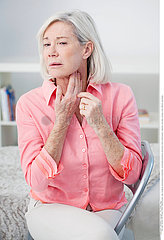ELDERLY PERSON WITH SORE THROAT